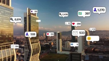 Social media icons fly over city downtown showing people engagement connection through social network application platform . Concept for online community and social media marketing strategy . High