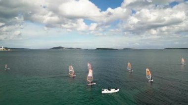 Cesmealti, Izmir , TURKEY january 19 2023 , Aerial view of Cesmealti windsurfers taken by drone. High quality 4k footage