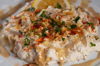 Traditional Turkish cuisine, Appetizer, salad made with eggplant and yoghurt. local name, Mutebbel. High quality photo