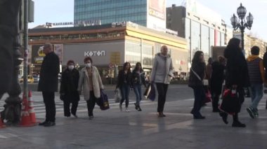 ANKARA, TURKEY , FEBRUARY 21, 2023 Kizilay square and skyscraper, People crowd walking on busy street on daytime . High quality 4k footage