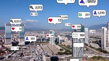Social media icons fly over city downtown showing people engagement connection through social network application platform . Concept for online community and social media marketing strategy . High