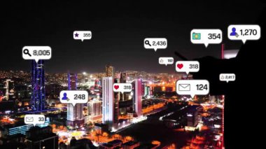 Social media icons fly over city downtown showing people engagement connection through social network application platform . Concept for online community and social media marketing strategy . High