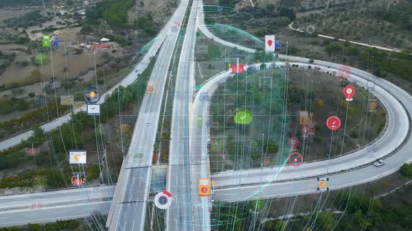 Intelligent Vehicles Cars Communicating Ai Logistic Autonomous Delivery Vehicles IoT GPS Tracking Satellite 5G Smart Roads Traffic Road Junction Interchange Motorway Triangulation Of Traffic Data