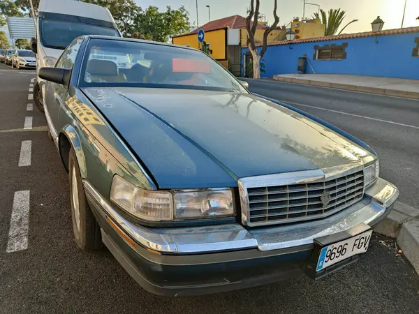 Stock image SANTA URSULA, SPAIN - JULY 26, 2023: Well preserved grayish green Cadillac Eldorado parked on the street. It is a luxury car produced by the American firm Cadillac between 1953 and 2002.