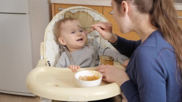 Happy Little Boy Opens Mouth Spoon Porridge Concept Parenting Healthy — Stockvideo