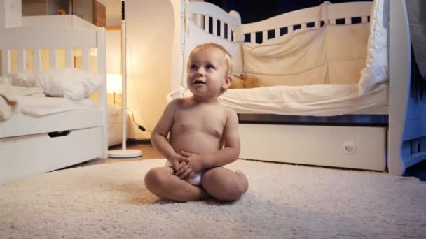 Cute Baby Boy Diapers Sitting Carpet Children Room Night Going — Stock Video
