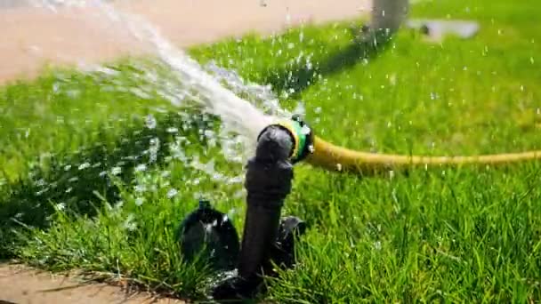 Slow Motion Water Leaking Splashing Damaged Garden Hose Water Waste — Stock Video
