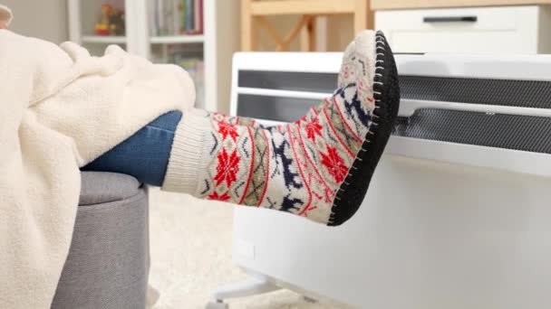 Closeup Woman Wearing Warm Socks Sitting Electric Heater Living Room — Stock Video