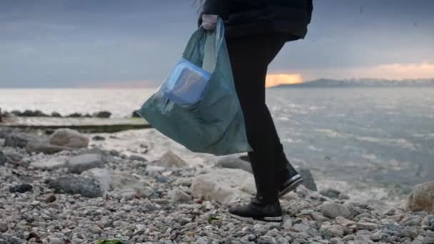 Female Volunteer Action Walking Sea Beach Collecting Waste Showcasing Her — Stock Video