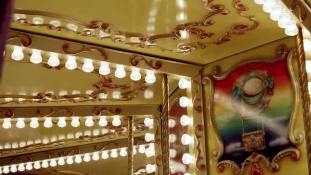 Slow Motion Illuminated Children Carousel Lots Light Bulbs Rotating Amusement — Stock Video