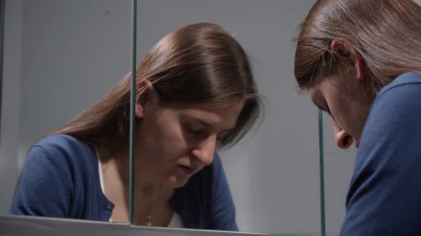 Upset Stressed Woman Sighs Bathroom Looks Her Reflection Mirror Concept — Stock Video