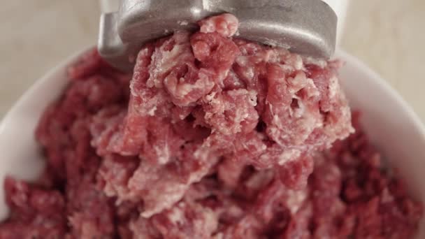 Closeup Minced Meat Coming Out Electric Grinder Falling Bowl Cooking — Stock Video