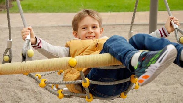 Happy Little Boy Swinging Net Rope Swing School Playground Active — Stock Photo, Image