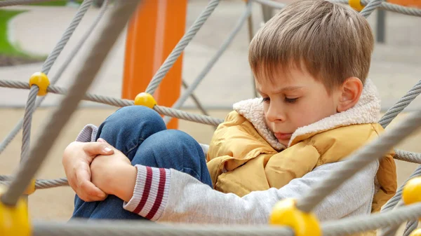 Portrait Upset Little Boy Sitting Alone Playground Feeling Sad — Stock Photo, Image