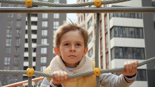 Portrait Smiling Little Boy Holding Tight Rope Playground Climbing High — Stock Photo, Image