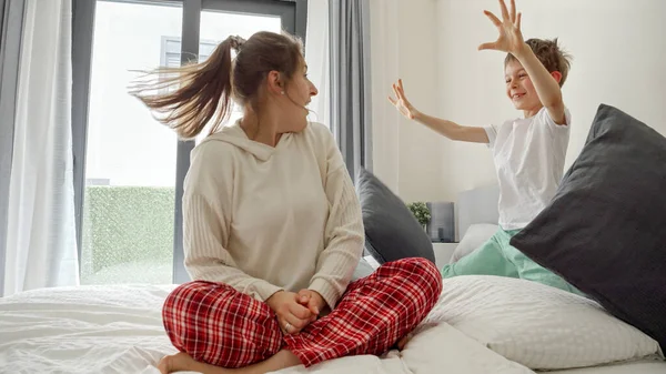 Happy Laughing Boy Scare Plays Mother Wearing Pajamas Bed Concept — Stock Photo, Image