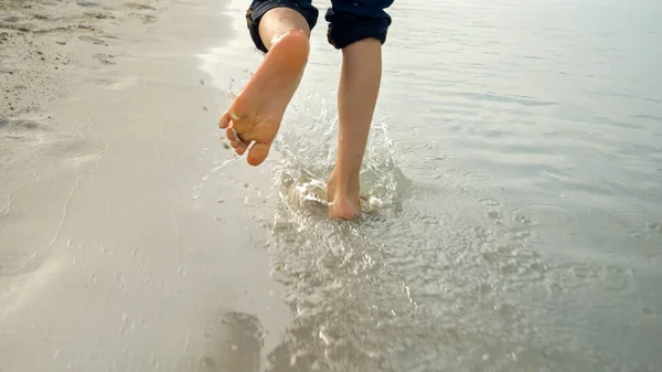 Slow Motion Boy Bare Feet Running Splashing Sea Water Sandy — Stock Photo, Image