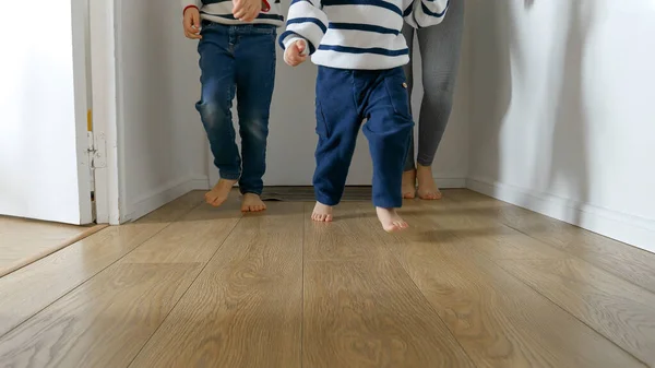 Closeup Playful Little Boys Mother Feet Running Wooden Floor Home — Stock Photo, Image