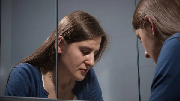 Upset Stressed Woman Sighs Bathroom Looks Her Reflection Mirror Concept — Stock Photo, Image