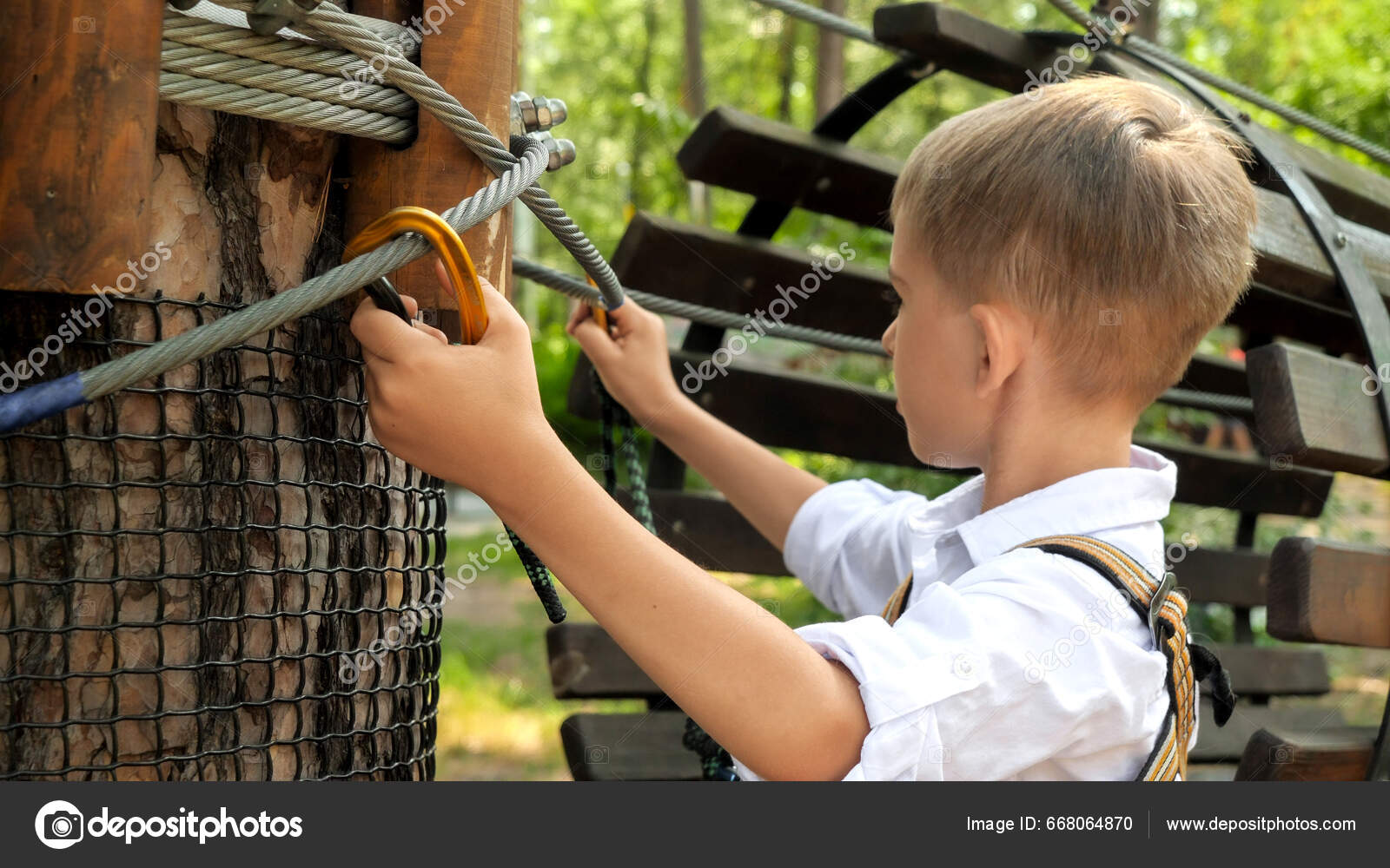 Portrait Little Boy Clamping His Safety Rope Hook While Climbing — Stock  Photo © Kryzhov #668064870