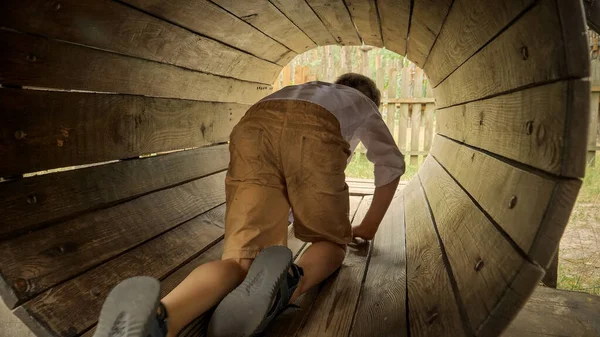 Cute Boy Crawling Wooden Tube Tunnel Summer Adventure Park Kids — Stock Photo, Image
