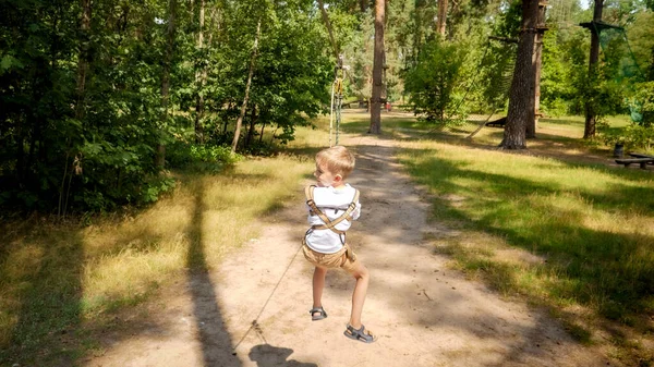Happy Cheerful Boy Riding Zip Line Rope Outdoor Adventure Park — Stock Photo, Image