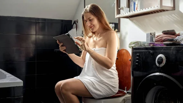 Woman Sitting Toilet Using Tablet Computer Concept Remote Work Education — Stock Photo, Image