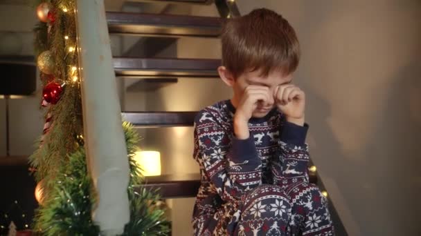 Portrait Upset Crying Boy Celebrating Christmas Sitting Alone Wooden Stairs — Stock Video