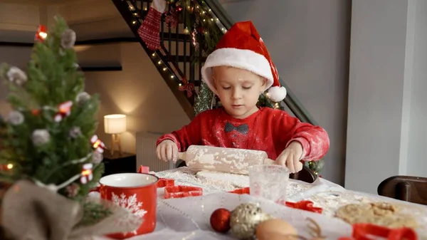 Cute Toddler Boy Santa Hat Making Dough Christmas Cookies Shaking — Stock Photo, Image