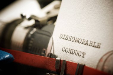 Dishonorable conduct text written with a typewriter. clipart