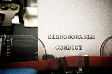 Dishonorable conduct text written with a typewriter. clipart