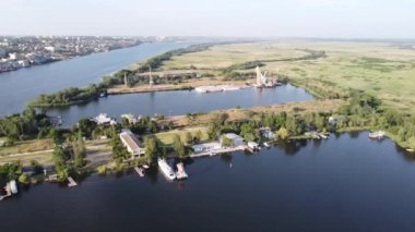 Kherson, Ukraine - June 6th 2023: Peaceful life of the city of Kherson. Dnieper River, pleasure yachts and ships. High quality FullHD footage
