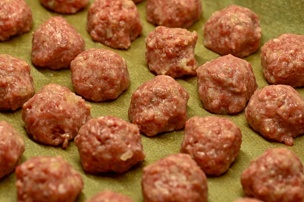 raw meat balls ready to bee cooked in owen Sweden december 22 2022