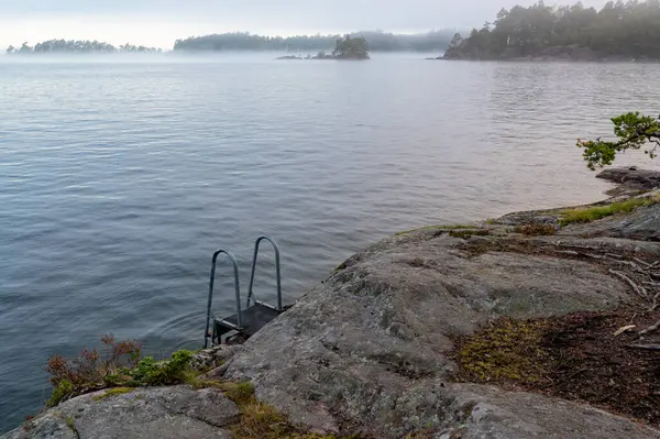 stock image bathing ladder to the cold water of Lake Vattern Motala Sweden September 20 2024