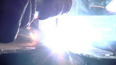 Welding Worker using Cutter Torch. Close Up. 