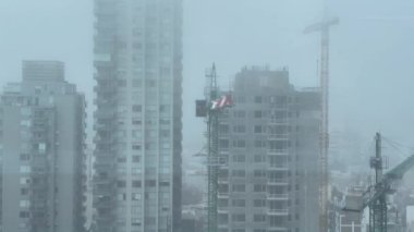 Construction Site of High-rise Apartment Skyscraper Tower in the Fog, Buenos Aires, Argentina. 4K Resolution.