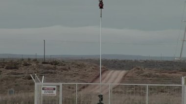 A Pumpjack operating at an Oil Well in the Neuquen Basin in northern Patagonia, Argentina. Close Up.  