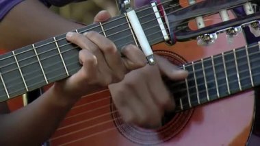 Men Playing Spanish Guitar Outdoors in Neuquen Province, Argentina. Close Up. 