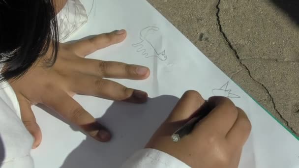 Hand Female Primary Student Drawing Sheet Paper Yard Public School — стоковое видео