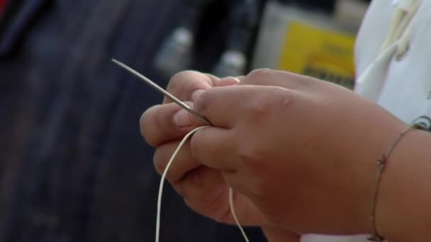 Hands Young Woman Holding Large Sewing Needle Thread While Sewing — Stock Video