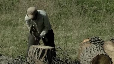 Drum Maker Cutting a Trunk While Crafting a 'Bombo Leguero' Argentine Drum Made with Wood and Animal Leather, Used in Local Traditional Folklore Music