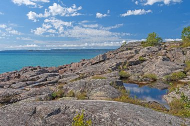 Granite Blocks on a Great Lakes Shore in Neys Provincial Park in Ontario clipart