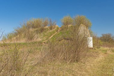 Former Ammunition Storage Bunker in the Prairie in the Medewin National Tallgrass Prairie in Illinois clipart