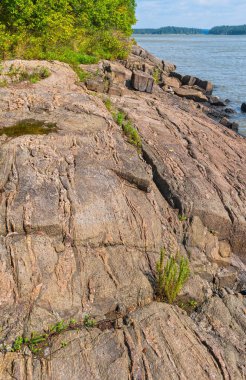 Layers of Gneiss in the Canadian Shield in Paint Lake Provincial Park in Mantoba clipart