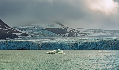 Massive Glacier Heading Down to the Ocean in Hornsund in the Svalbard Islands clipart