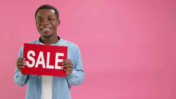 Portrait Happy African American Denim Shirt Raises Banner Inscription Sale — Stock video
