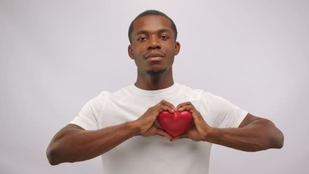 Positive African American Man Holding Red Heart His Hands White — Stock video