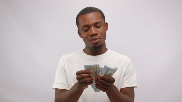 Happy Smiling Young Content African American Man Counting Dollars White — Wideo stockowe