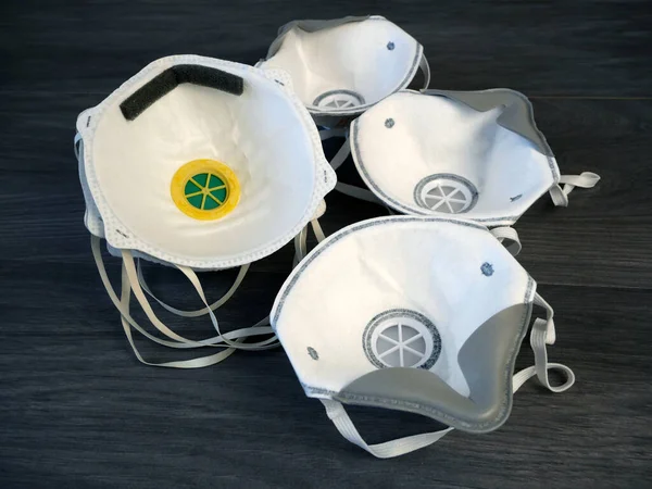 respirators with high protection level. Protection against coronavirus covid-19 and other infectious diseases transmitted by airborne droplets . Respritors production, packing and delivery. Top view