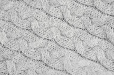 Details of knitted woolen fabric. gray textile background. Woolen Texture Background, Knitted Wool Fabric, Hairy Fluffy Textile, texture, closeup